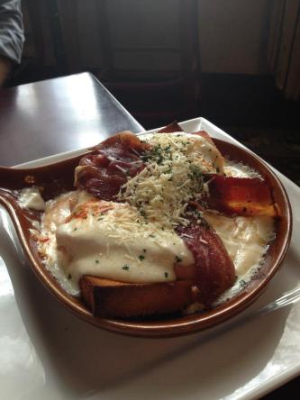 The original Hot Brown - white texas toast, carved turkey, bacon, mornay sauce and some cheese.